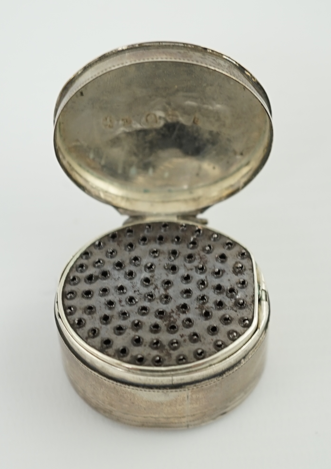 A George III silver oval nutmeg grater by Cocks & Bettridge?